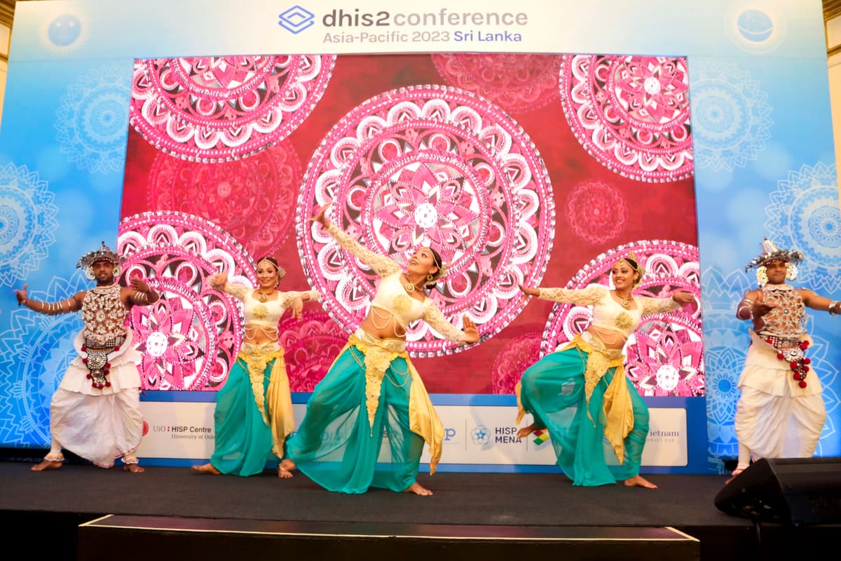 Five Sri Lankan dancers performing on the Asia-Pacific Conference stage in Colombo