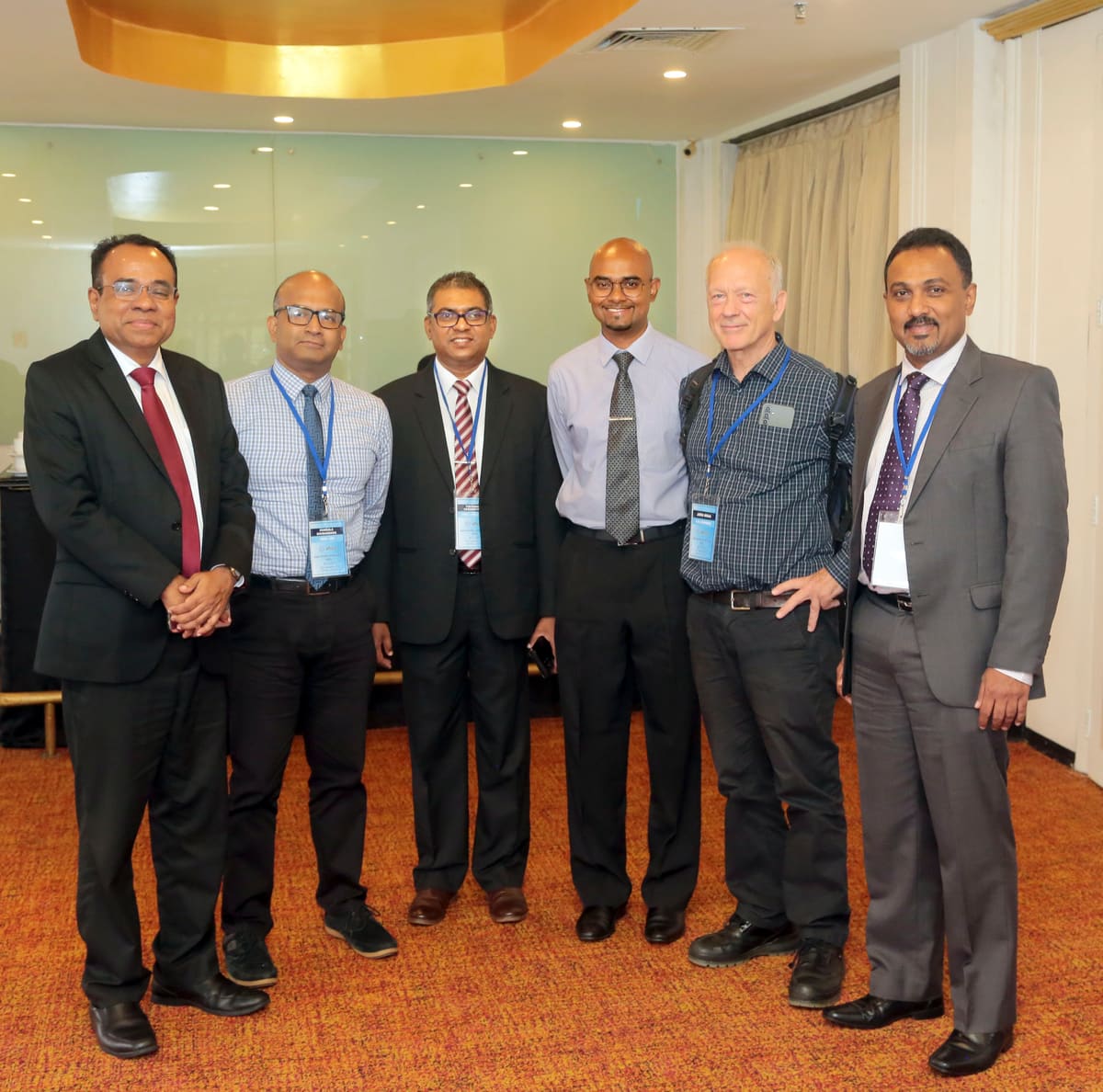 Six members of the regional HISP community posing together at the conference
