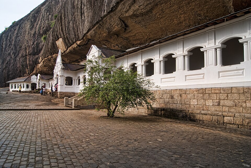 Buddha statues and painted walls inside Dambulla Cave Temple